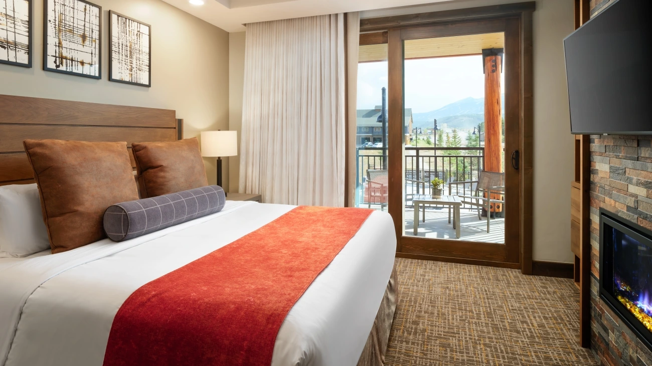 Villa bedroom with a scenic mountain view